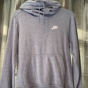 Grey Nike sweatshirt with a cowl neck.